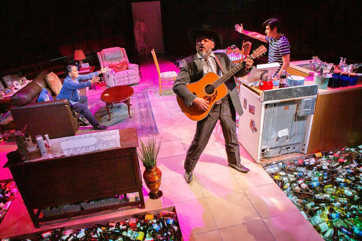 Zilah Mendoza, left, Jesse J. Perez and Matthew Martínez in the Old Globe's "El Borracho."
