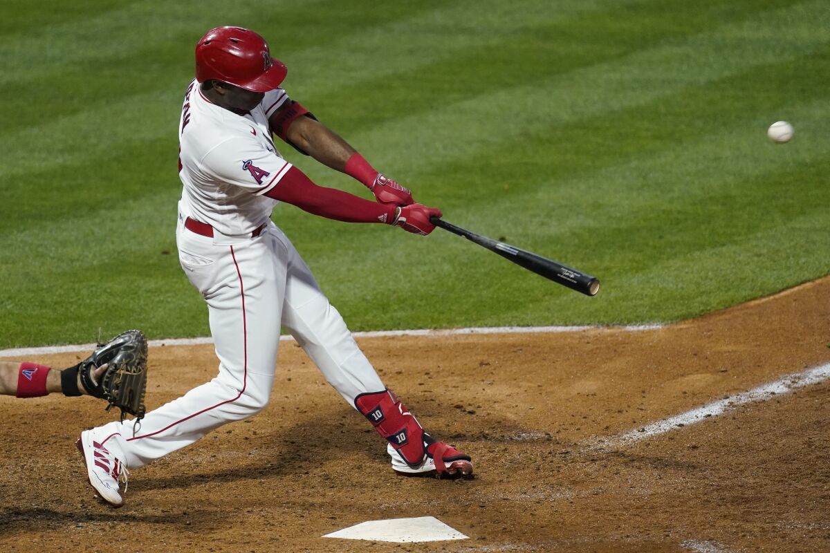 Angels outfielder Justin Upton hits a home run against the Cleveland Indians on Tuesday.