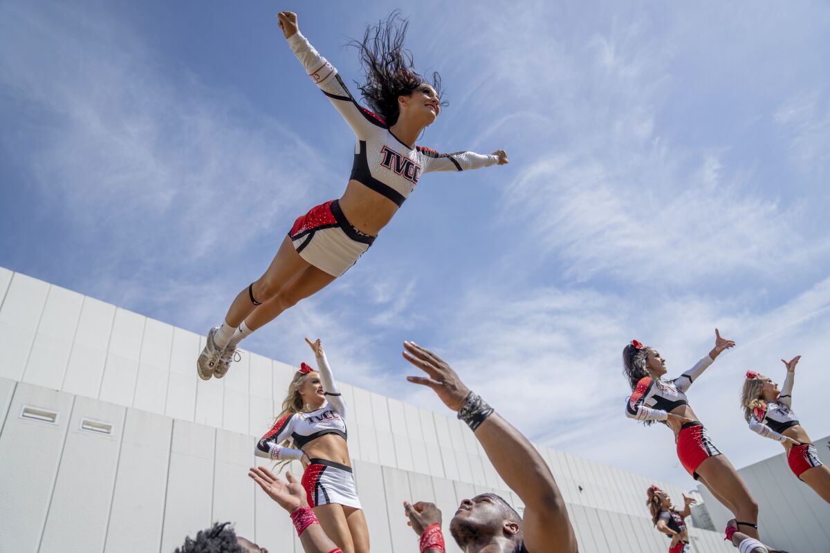 This image released by Netflix shows Trinity Valley Community College cheerleader Maddie Volcik in a scene from "Cheer." (Netflix via AP)