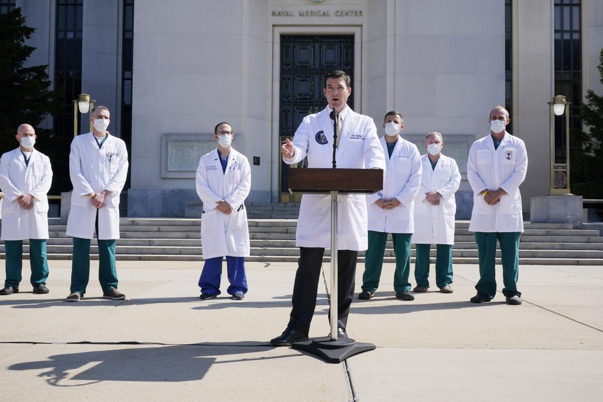 Dr. Sean Conley, physician to President Trump, and other doctors outside Walter Reed National Military Medical Center