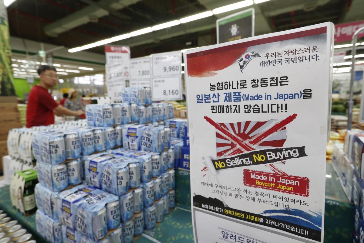 A supermarket in South Korea displays a sign in July announcing a boycott of Japanese products in retaliation for trade restrictions placed by Japan on South Korea.