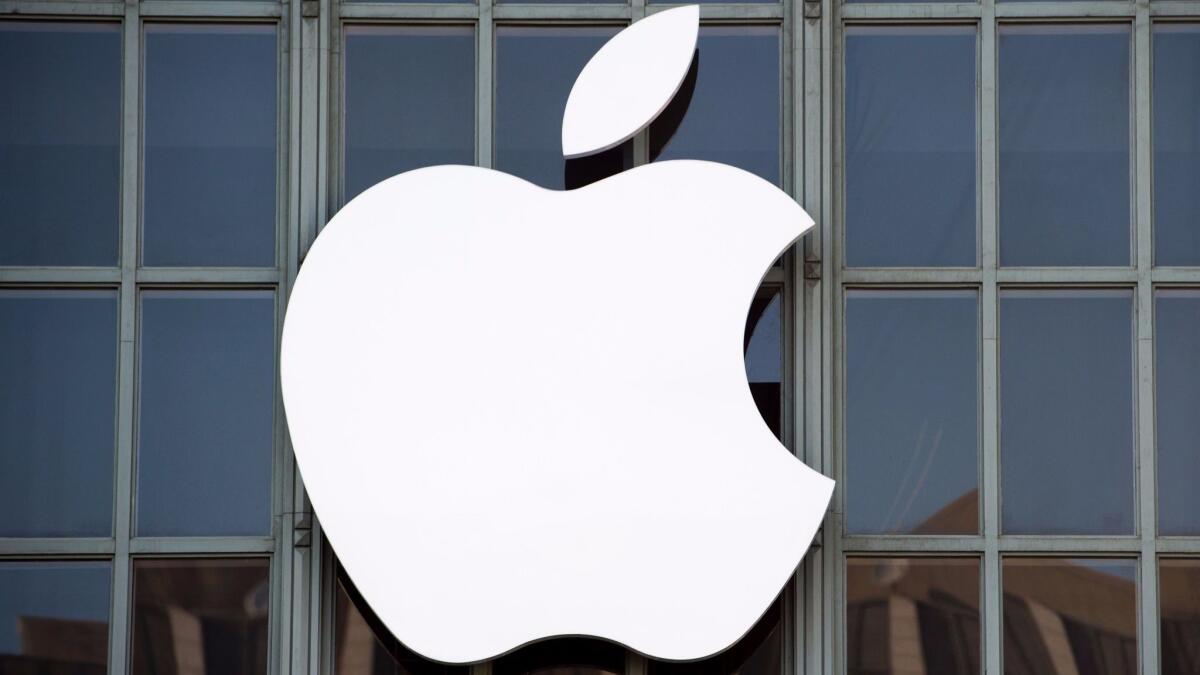 Apple just hired two Sony TV executives to build its original programming business.
