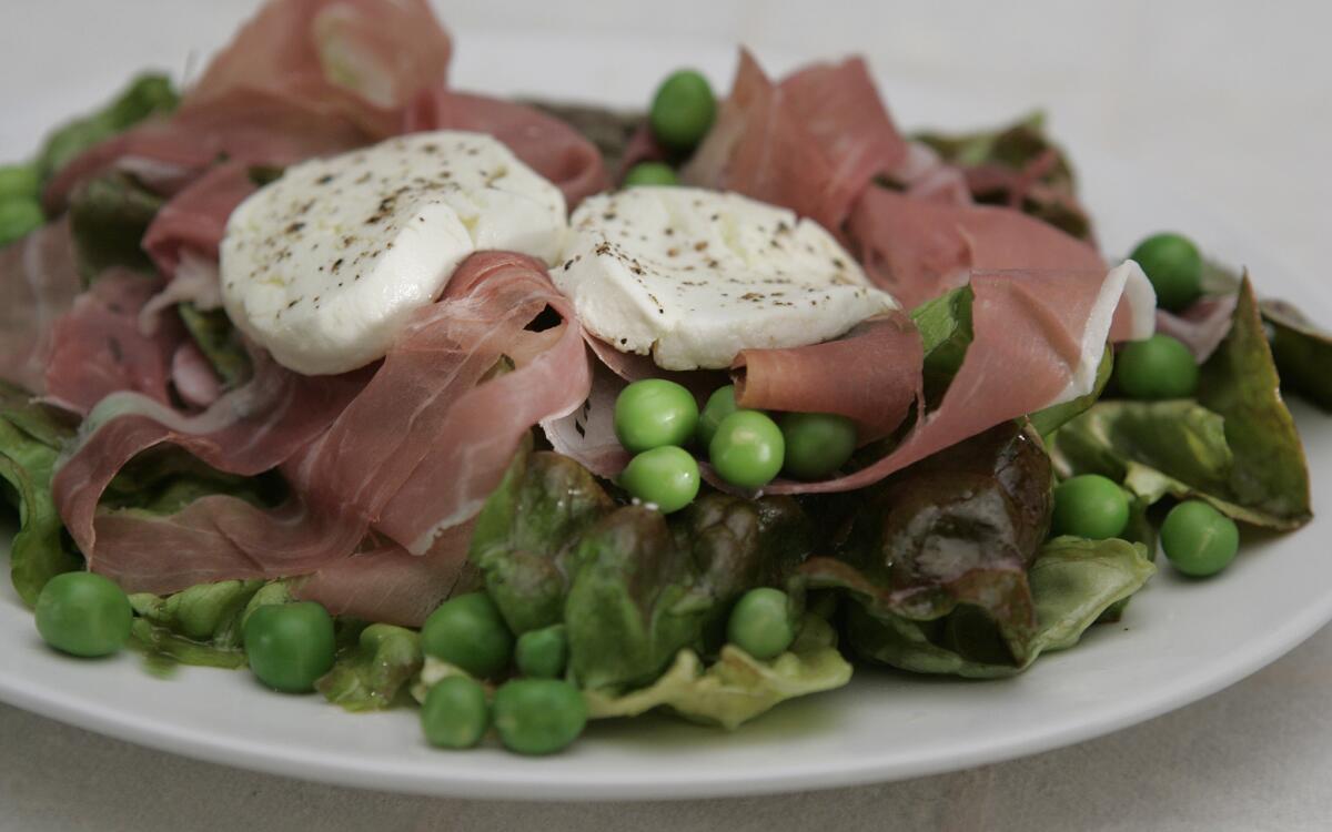 Market salad with English peas, prosciutto and goat cheese
