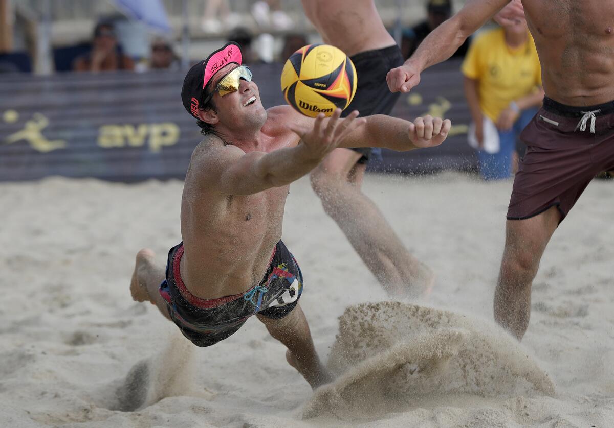 Troy Field runs down a deep ball to keep a long rally alive during the men's final of the Laguna Open on Sunday.