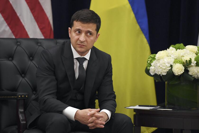 US President Donald Trump(not shown) speaks as Ukrainian President Volodymyr Zelensky looks on during a meeting in New York on September 25, 2019, on the sidelines of the United Nations General Assembly. (Photo by SAUL LOEB / AFP) (Photo credit should read SAUL LOEB/AFP/Getty Images)