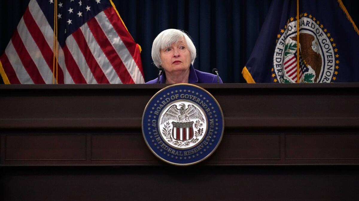 Federal Reserve Chairwoman Janet L. Yellen listens to a question during her last news conference as the central bank's chief on Dec. 13.