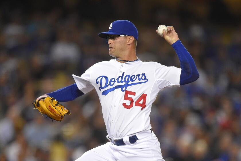 David Huff gave up four earned runs on seven hits through four innings in a spot start for the Dodgers against the Seattle Mariners on April 14.