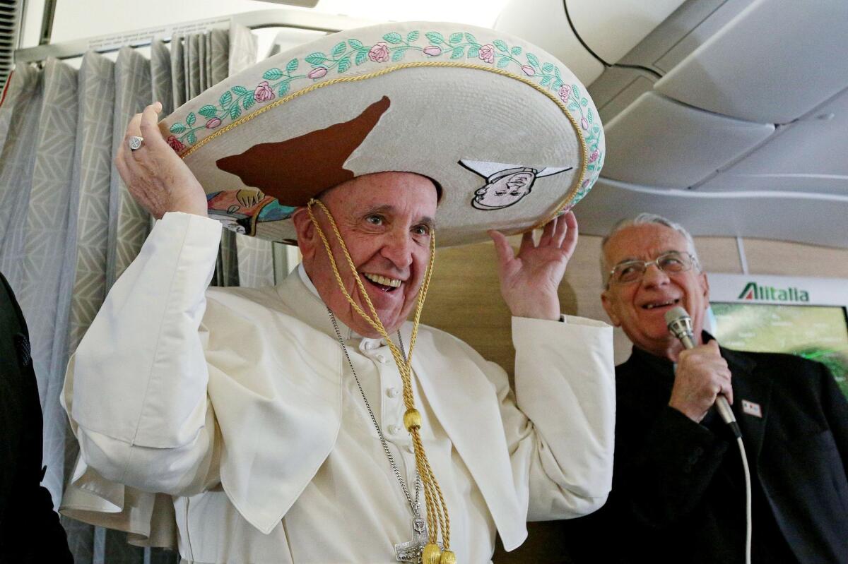 Pope Francis wearing a sombrero.