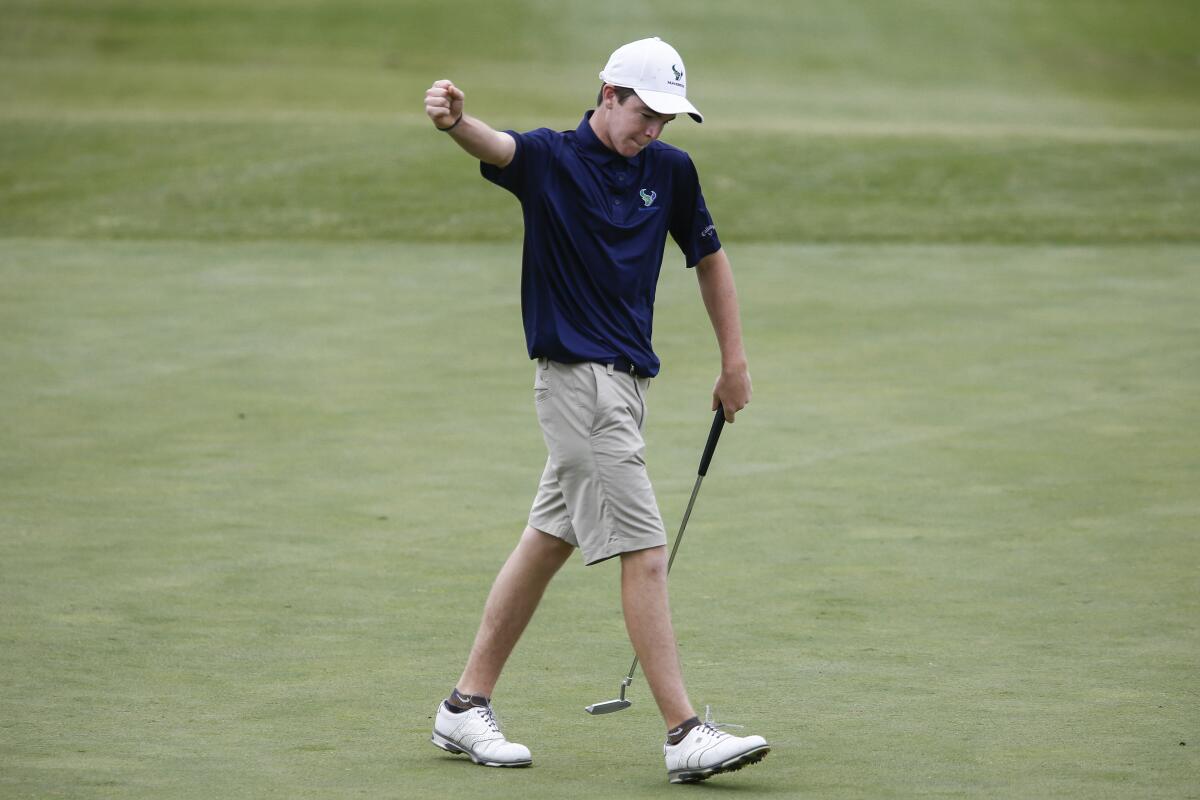 La Costa Canyon's Luke Potter reacts after sinking putt in 2019 CIF San Diego Section boys golf championship.