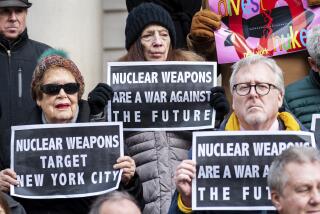 Activists rally at a press conference calling for the divestment from nuclear weapons on the steps of City Hall in New York City on January 28, 2020. (Photo by Gabriele Holtermann-Gorden/Sipa USA)(Sipa via AP Images)