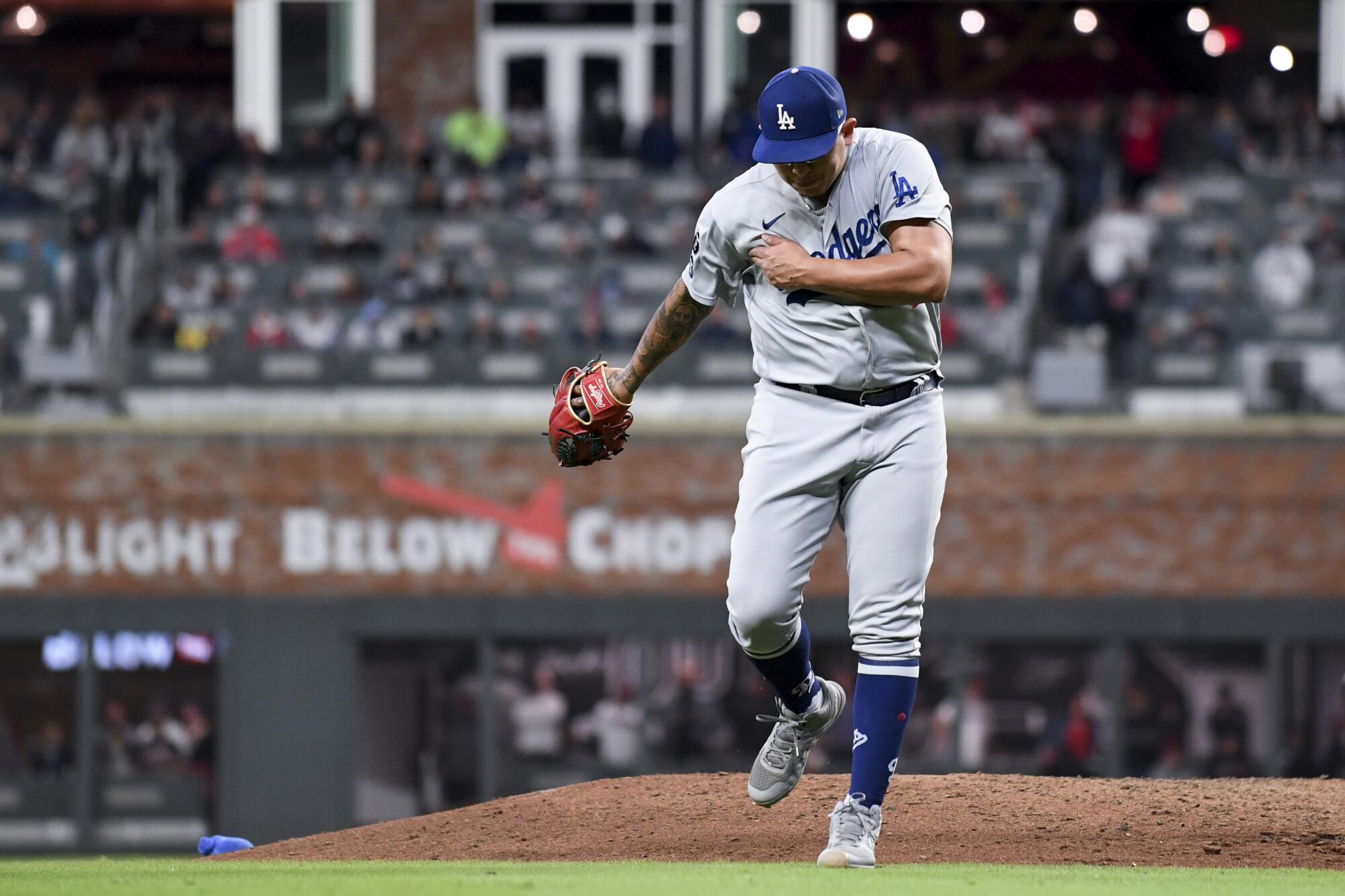Los Angeles Dodgers starting pitcher Julio Urias while leaving the field after giving up two runs