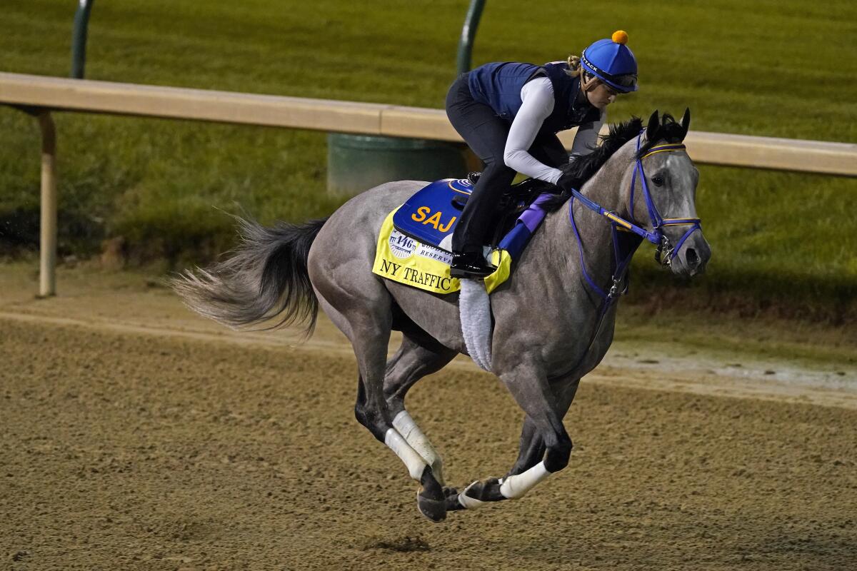 Kentucky Derby entry Ny Traffic runs during a morning workout at Churchill Downs on Friday.