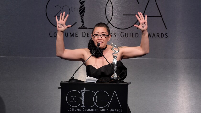 Costume designer Ane Crabtree accepts the award for excellence in contemporary television for "The Handmaid's Tale" during the Costume Designers Guild Awards at the Beverly Hilton Hotel in Beverly Hills on Tuesday.