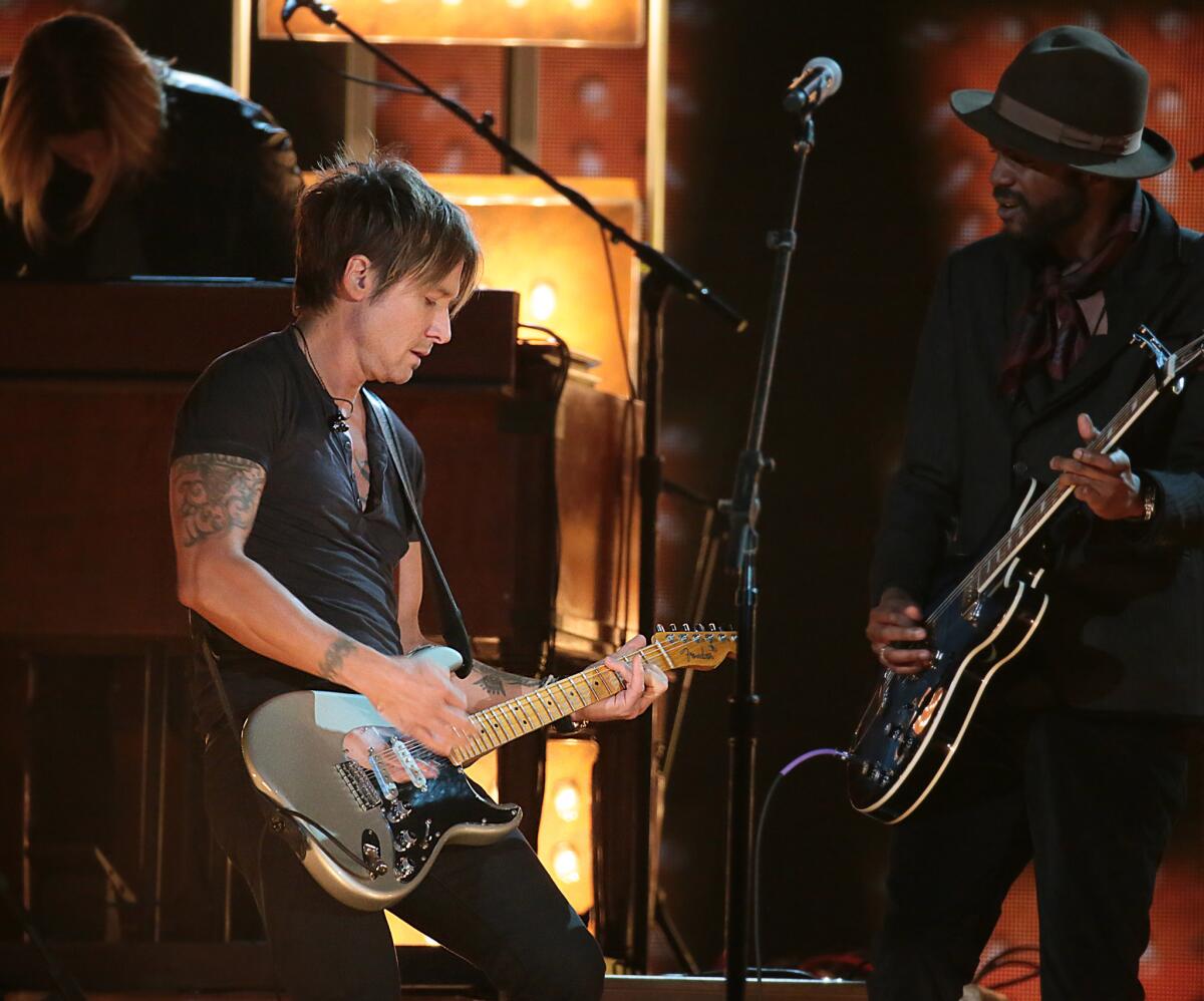 A man was accused of rape at a Keith Urban show in Massachusetts on Saturday. In the photo above, Urban performs at the Grammy Awards in January.