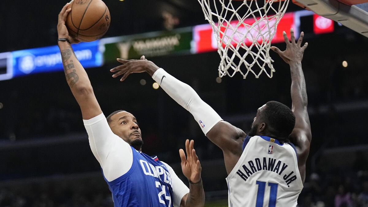 Norman Powell of the LA Clippers drives to the basket during the