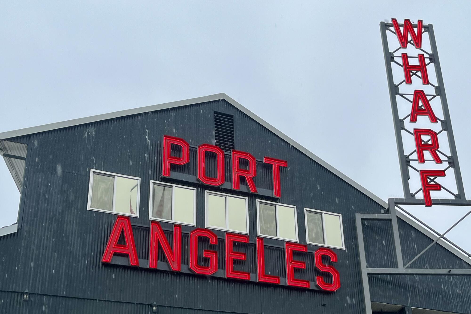 Signage marking the wharf in Port Angeles, Wash.