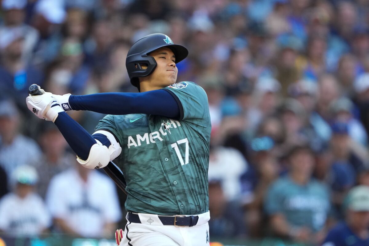 American League's Shohei Ohtani, of the Angels, swings at a pitch.