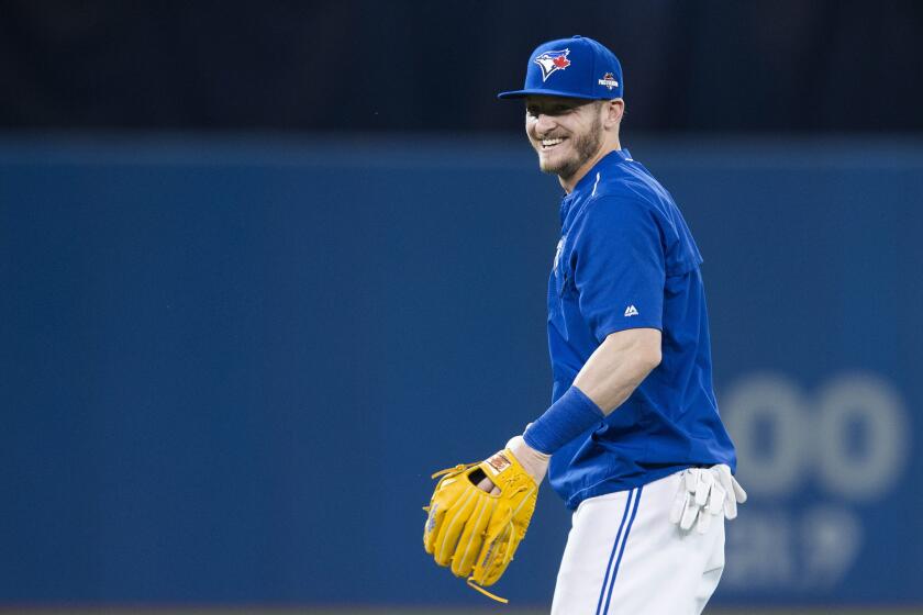 Blue Jays slugger Josh Donaldson laughs during a team workout at the Rogers Centre on Wednesday.