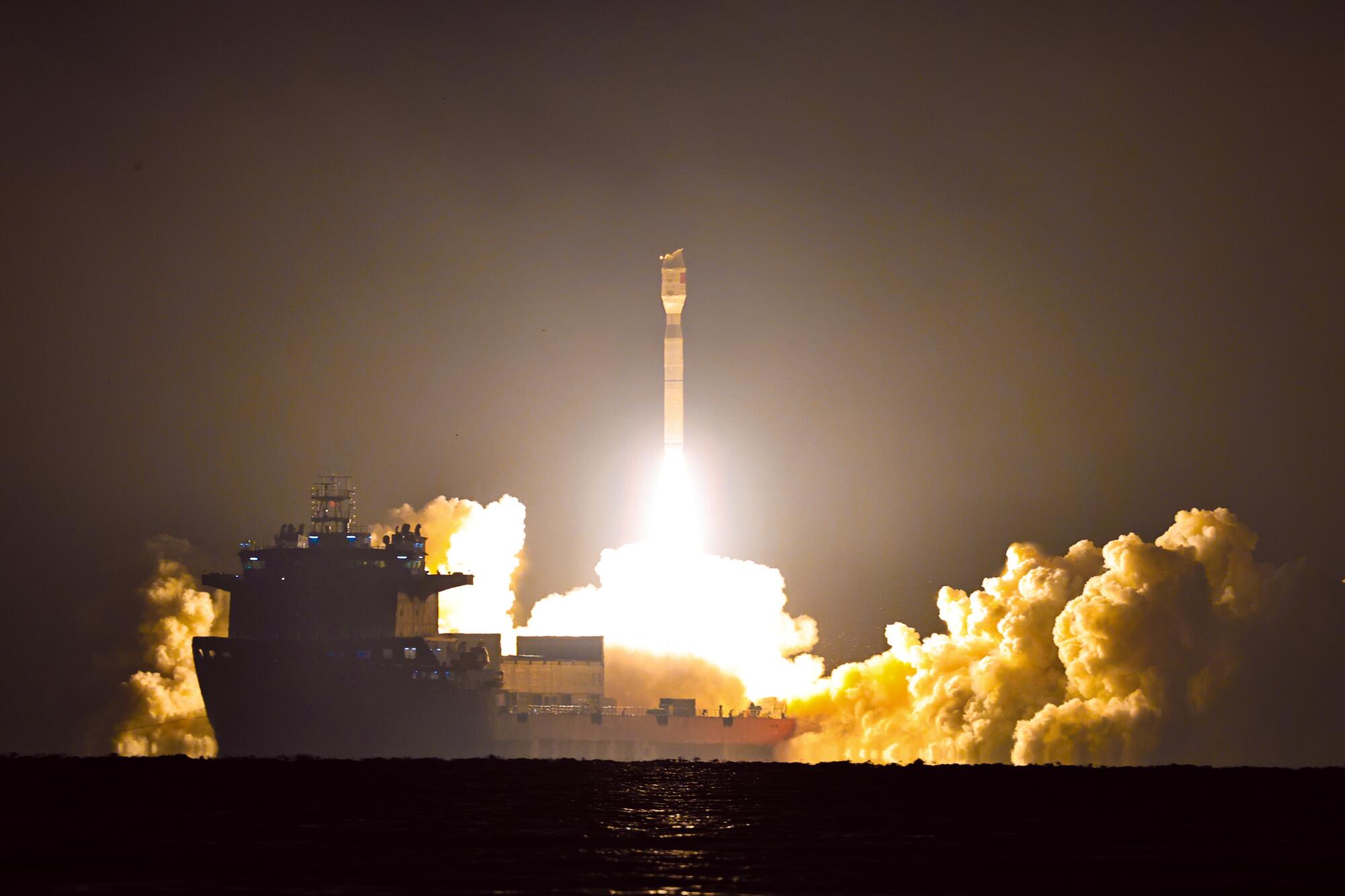 A Smart Dragon-3 rocket carrying the Geely-05 constellation satellites lifts off from sea