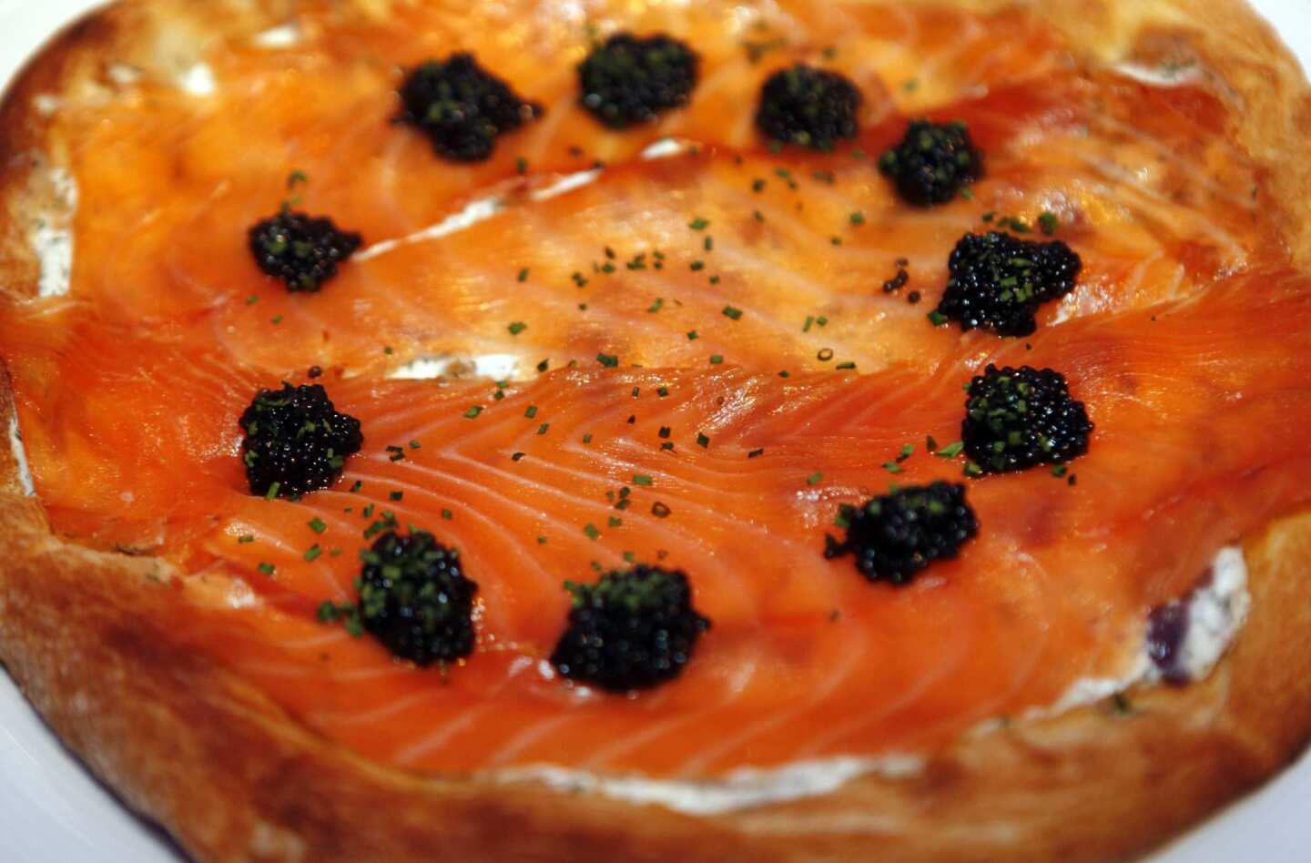 Pizza with smoked salmon and caviar.
