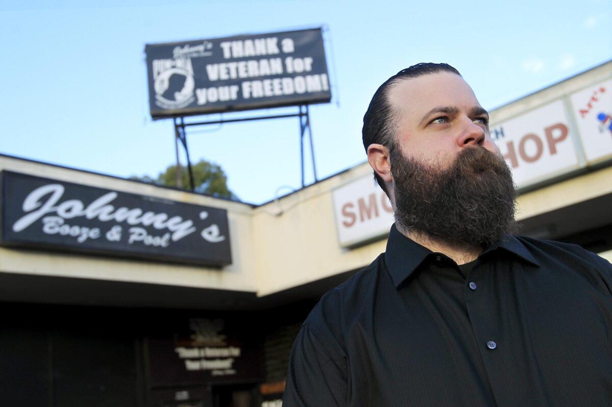 Johnny Nosich in front of Johnny’s Saloon in 2013.