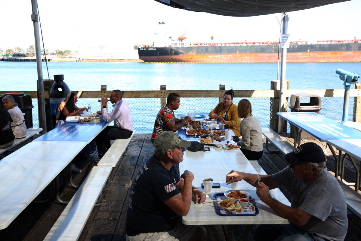 Dining beside the water at the San Pedro Fish Market in San Pedro.