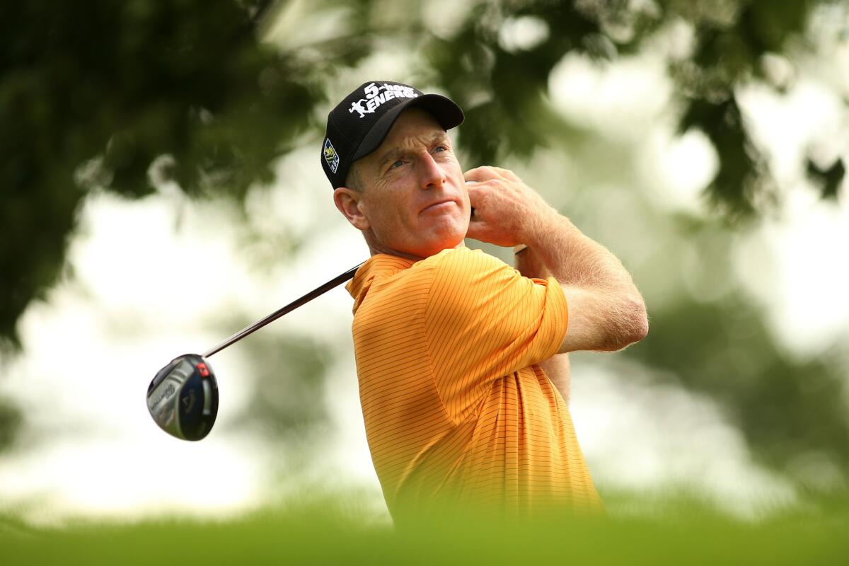 Co-leader Jim Furyk plays his shot from the 11th tee Saturday during the third round of The Barclays at The Ridgewood Country Club in Paramus, N.J.
