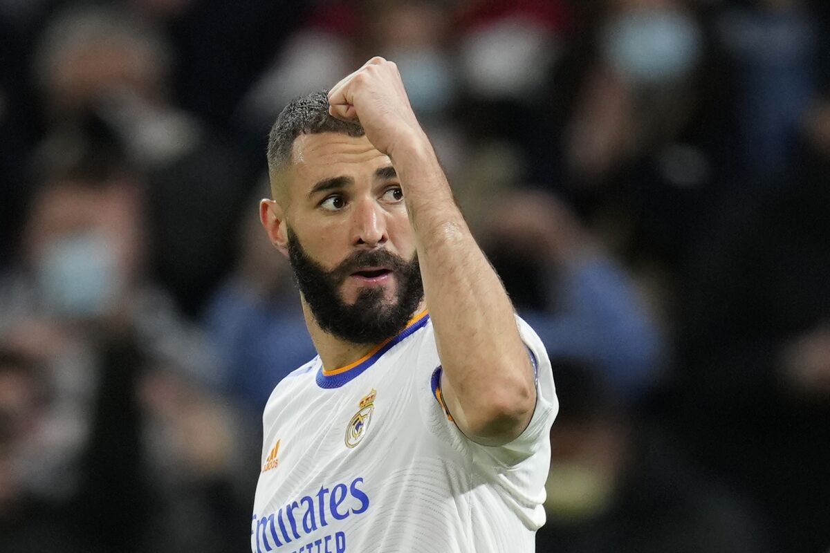 Real Madrid's Karim Benzema celebrates after scoring his side's second goal during a Group D Champions League soccer match between Real Madrid and Shakhtar Donetsk at the Santiago Bernabeu stadium in Madrid Spain, Wednesday, Nov. 3, 2021. (AP Photo/Manu Fernandez)