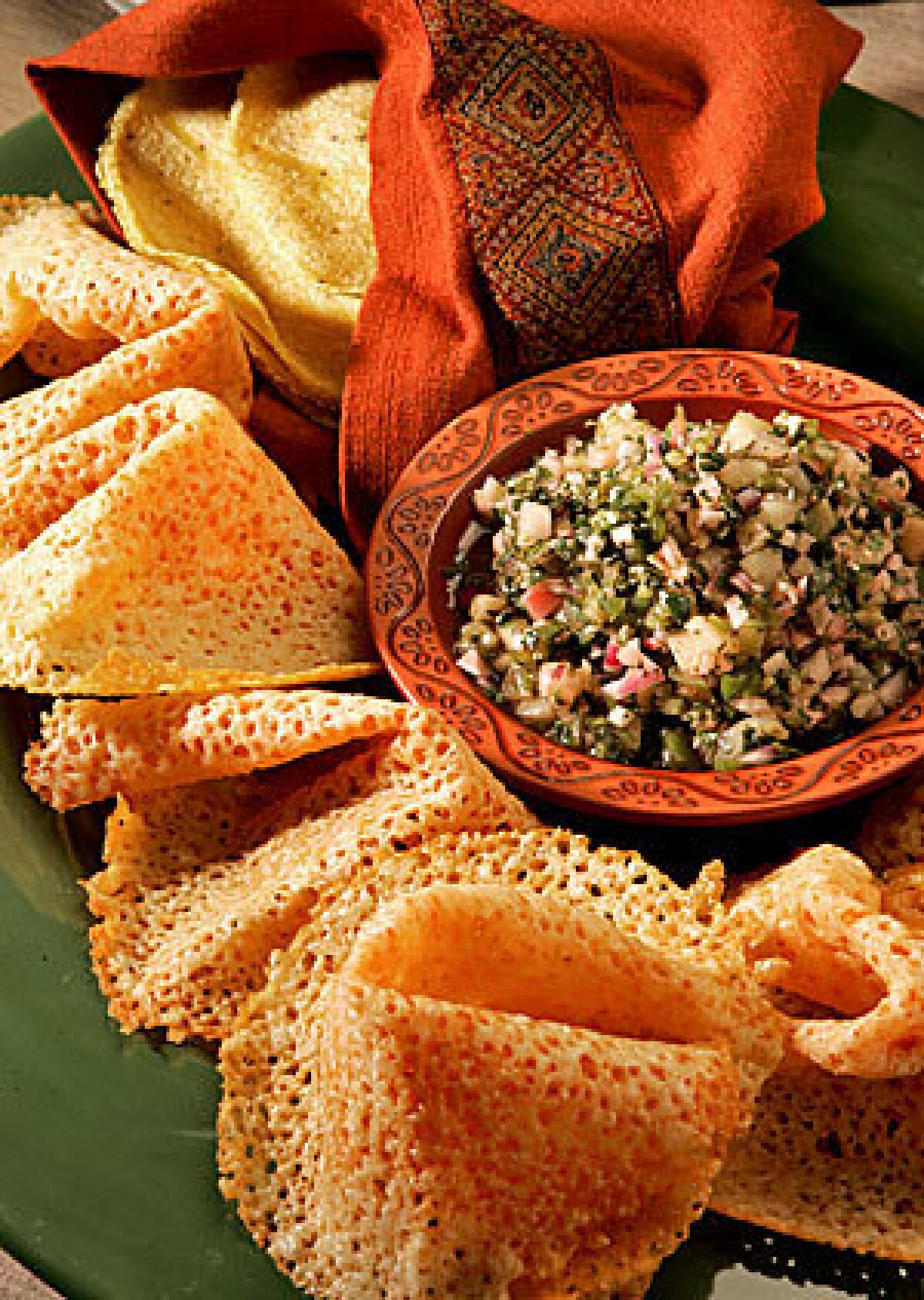 SAVORY: Chicharrones de queso with tomatillo-radish salsa and tortillas.