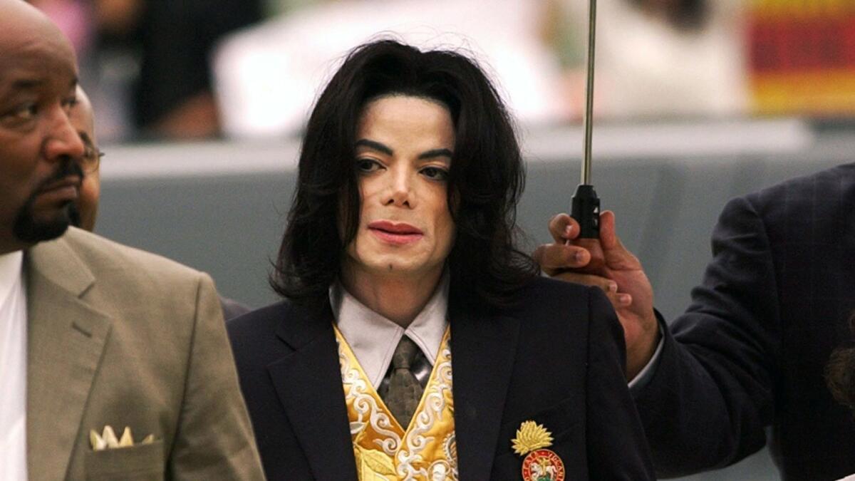 Michael Jackson arrives at the Santa Barbara County Courthouse in Santa Maria, Calif., for his trial on charges of child molestation.