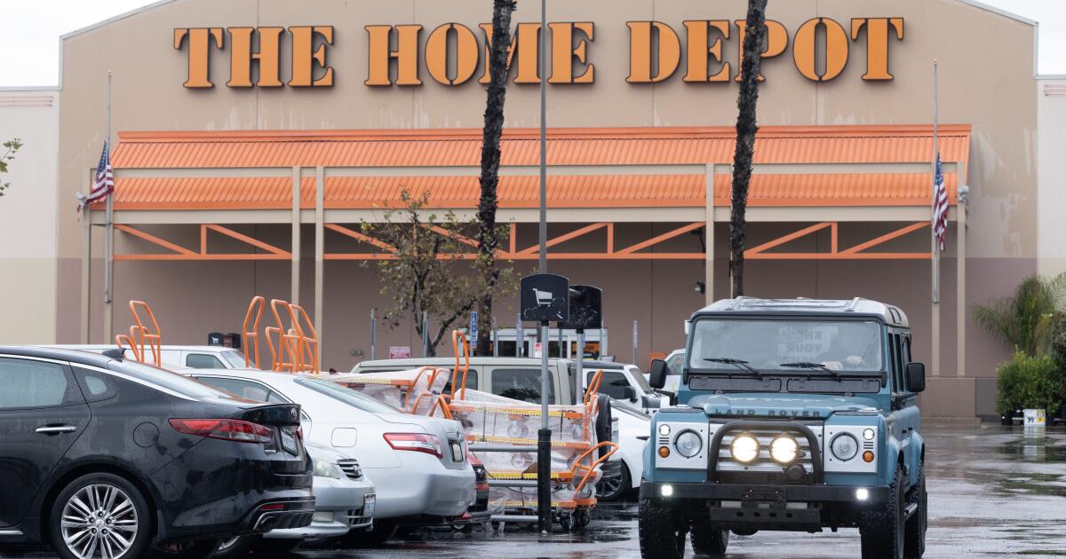 PANORAMA CITY, CA - NOVEMBER 21: A Liberty Van (SUV) drives through the parking lot of a Home Depot in Panorama City on Friday, Nov. 21, 2025. The three vehicles are deployed every day at 6 a.m. visiting various Home Depots where laborers might gather. The Save America Movement rolled out Operation Liberty-a rapid-response and civic empowerment initiative to ensure the American people have a clear understanding of the actions and impact of ICE operations in communities. The rapid-response vehicles are staffed by trained volunteers to document ICE activities in real time and support impacted communities. (Myung J. Chun / Los Angeles Times)