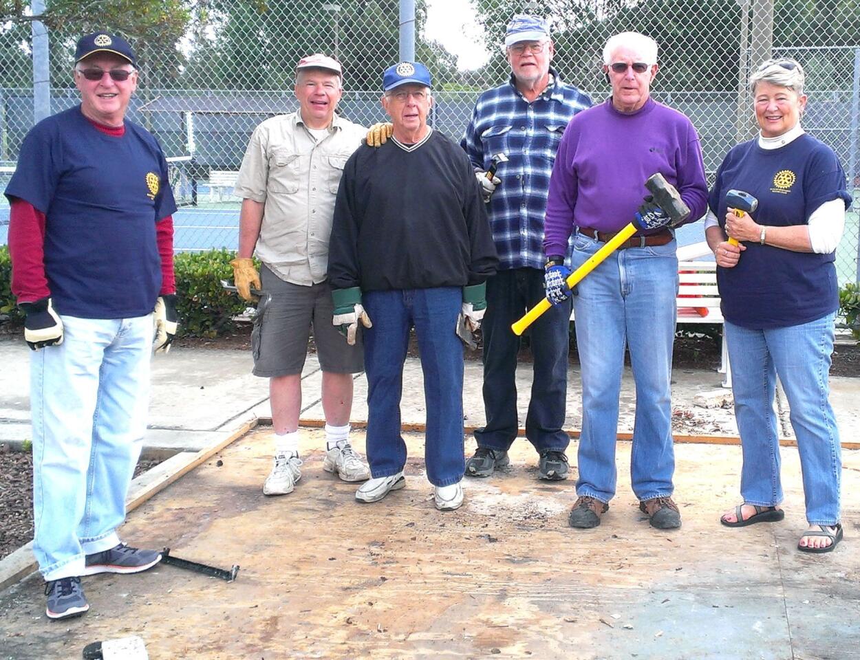 Among those demolishing the old storage shed at the Ed Brown Senior Center were Rancho Bernardo Rotarians, from left, Ron Hunt, John Goodrich, Paul Donnick, Larry Saunders, Dan Malloy and Cathy Glover.