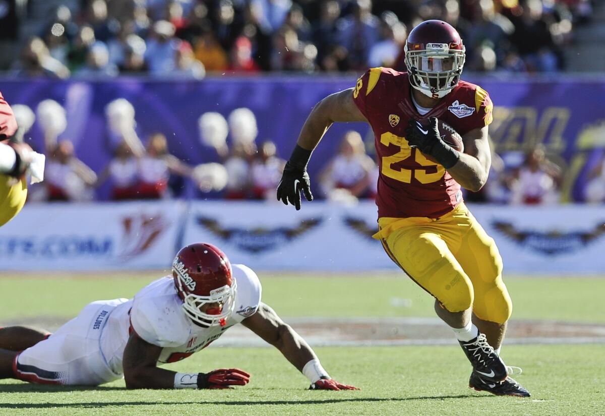 USC running back Ty Isaac breaks into the clear against Fresno State during the 2013 Las Vegas Bowl.