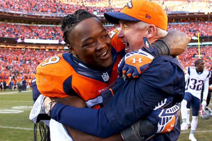 Broncos linebacker Danny Trevathan, a key playmaker for Denver's defense, embraces Coach John Fox after defeating the New England Patriots in the AFC championship game.