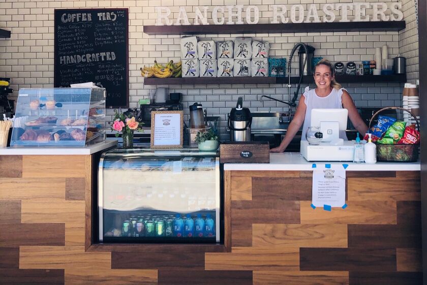 Courtney Cindrich opened the new Rancho Roasters coffee shop in the village.