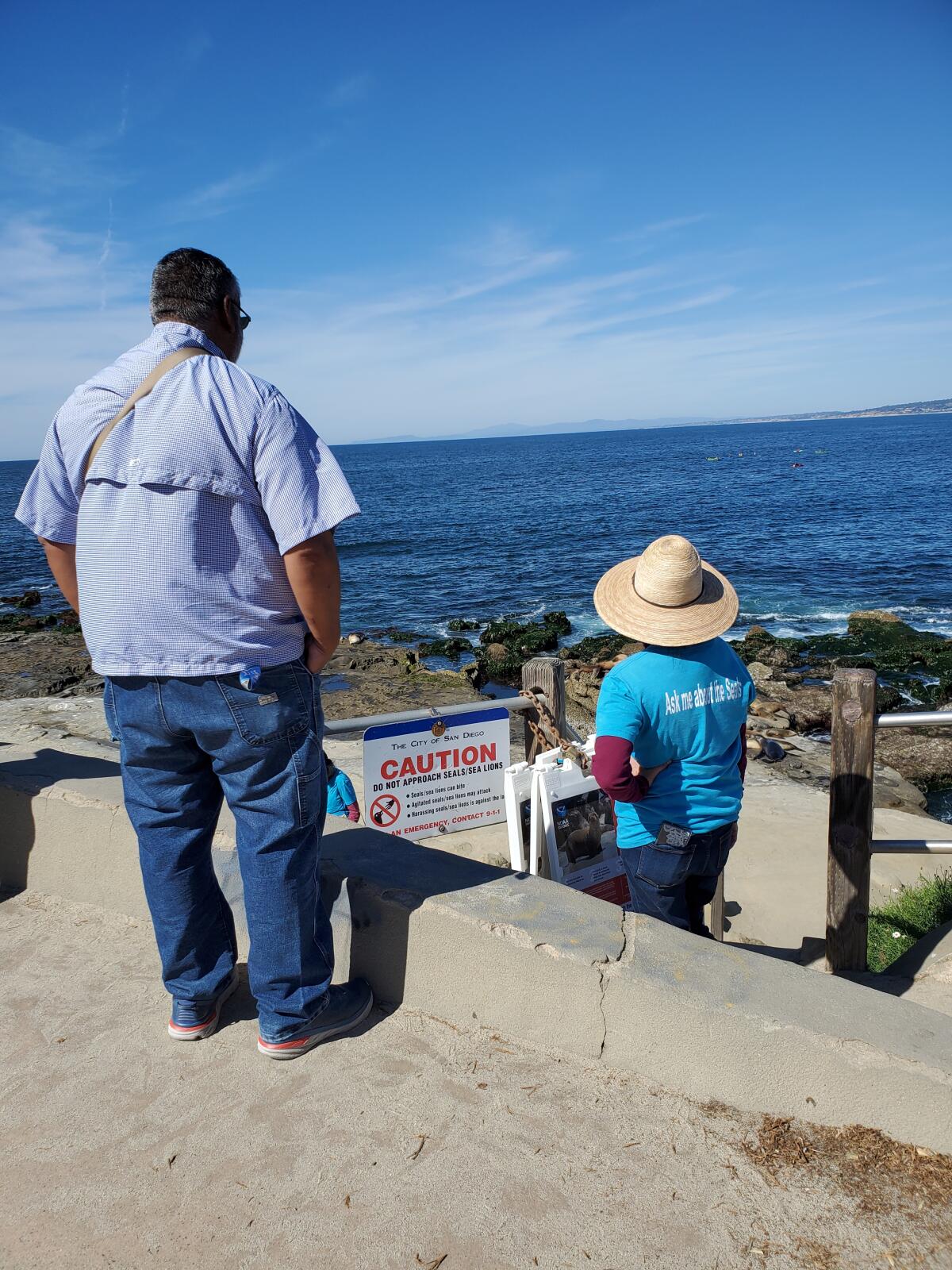 Seal Society docent Robyn Davidoff stands at the top of the stairs leading to the Point La Jolla bluffs.