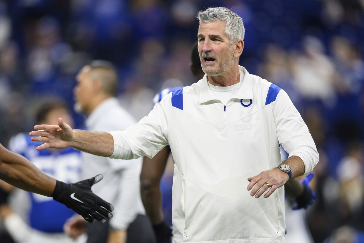 FILE - Indianapolis Colts head coach Frank Reich gestures on the field before an NFL football game against the Washington Commanders, Sunday, Oct. 30, 2022, in Indianapolis. The Carolina Panthers announced Thursday, Jan. 26, 2023, they have agreed to terms with Frank Reich to become their new head coach. (AP Photo/Zach Bolinger, File)