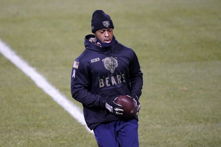 Chicago Bears wide receiver Allen Robinson II warms up before the start of an NFL football game between the Chicago Bears and the Minnesota Vikings Monday, Nov. 16, 2020, in Chicago. (AP Photo/Nam Y. Huh)