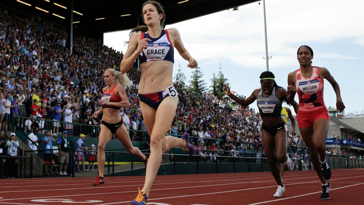 Kate Grace wins the women's 800-meter final at the Olympic track and field trials in Eugene, Ore. The International Olympic Committee prevents brands that aren't major sponsors -- such has Grace's apparel provider, Oiselle -- from referring to the Olympics in ads.