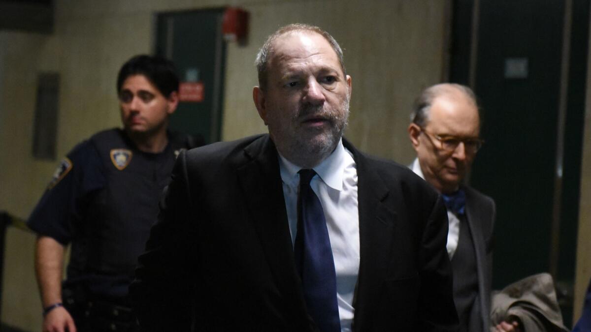 Harvey Weinstein exits the courtroom after a hearing in State Supreme Court. Weinstein is facing rape and sexual assault charges from two separate incidents.