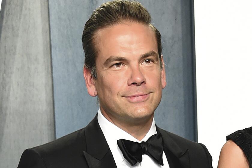 FILE - Lachlan Murdoch appears at the Vanity Fair Oscar Party in Beverly Hills, Calif., on Feb. 9, 2020. Rupert Murdoch is stepping down at Fox and News Corp, son Lachlan will take over as chairman of both companies. For Lachlan Murdoch, this has been a long time coming — assuming, that is, his moment has actually arrived. On Thursday, his father Rupert Murdoch announced that he’s stepping down as the head of his two media companies — News Corp. and Fox Corp. -- as of November. (Photo by Evan Agostini/Invision/AP, File)
