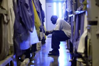 IONE, CA - AUGUST 28: An inmate at the Mule Creek State Prison sits on his bunk bed in a gymnasium that was modified to house prisoners August 28, 2007 in Ione, California. A panel of three federal judges is looking to put a cap on the California State Prison population after class action lawsuits were filed on behalf of inmates who complained of being forced to live in classrooms, gymnasiums and other non-traditional prison housing. California prisons house nearly 173,000 inmates with over 17,000 of them in non-traditional housing. The Mule Creek State Prison has had to modify several facilities to make room for an increasing number of inmates. (Photo by Justin Sullivan/Getty Images)