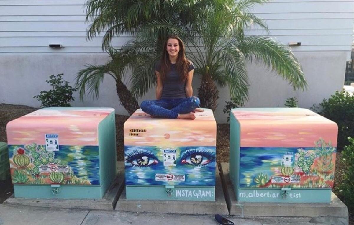 Marina with her electrical boxes in Cardiff.