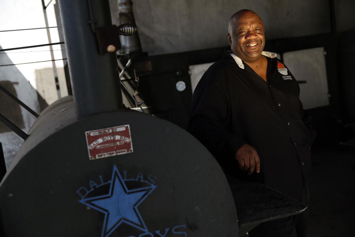 Kevin Bludso, with the smoker at his Compton restaurant Bludso's Bar & Que