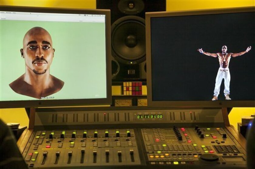 In this photo taken Tuesday, June 12, 2012, video images of the Tupac Shakur hologram are displayed on a computer monitor at the Subtractive Studio in Santa Monica, Calif. When Tupac Shakur rose from the stage in the California desert earlier this year, it was not only a jaw-dropping resurrection, but also the beginning of a new form of live entertainment. Stars wield extensive control over how their names, voices and images are used after they die through likeness, trademark and copyright protections, and now holograms offer them yet another consideration. (AP Photo/Damian Dovarganes)