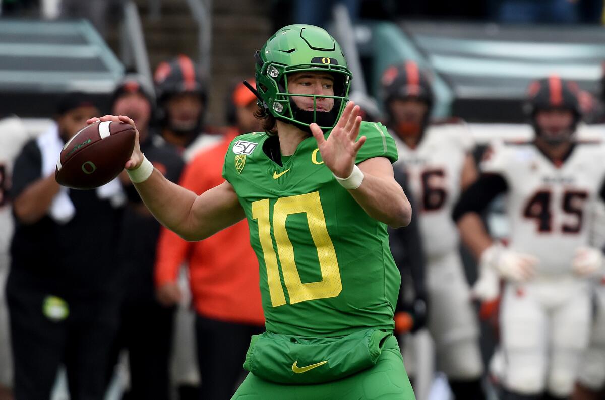 Oregon quarterback Justin Herbert was drafted No. 6 overall by the Chargers on Thursday.