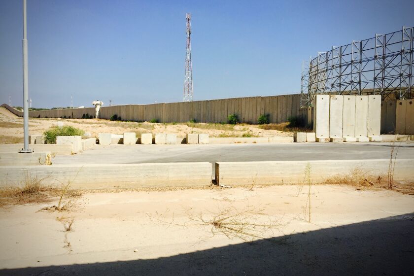 The concrete wall that surrounds the Gaza Strip is shown in 2015.