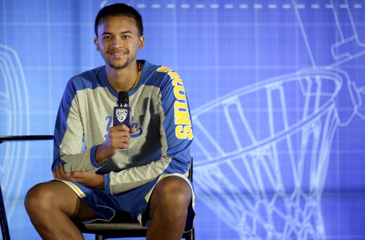 UCLA sophomore Kyle Anderson fields questions during the the Pac-12 Conference basketball media day in San Francisco on Thursday.