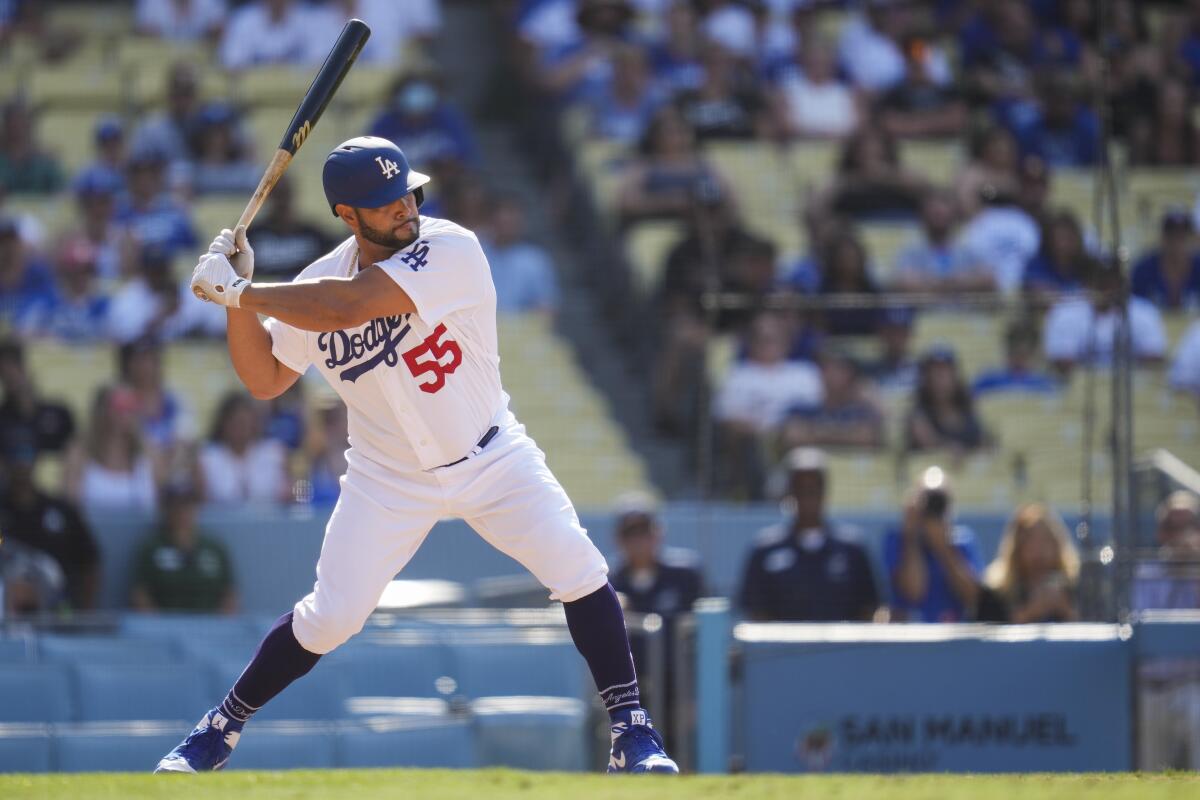 Los Angeles Dodgers first baseman Albert Pujols holds his bat at the plate