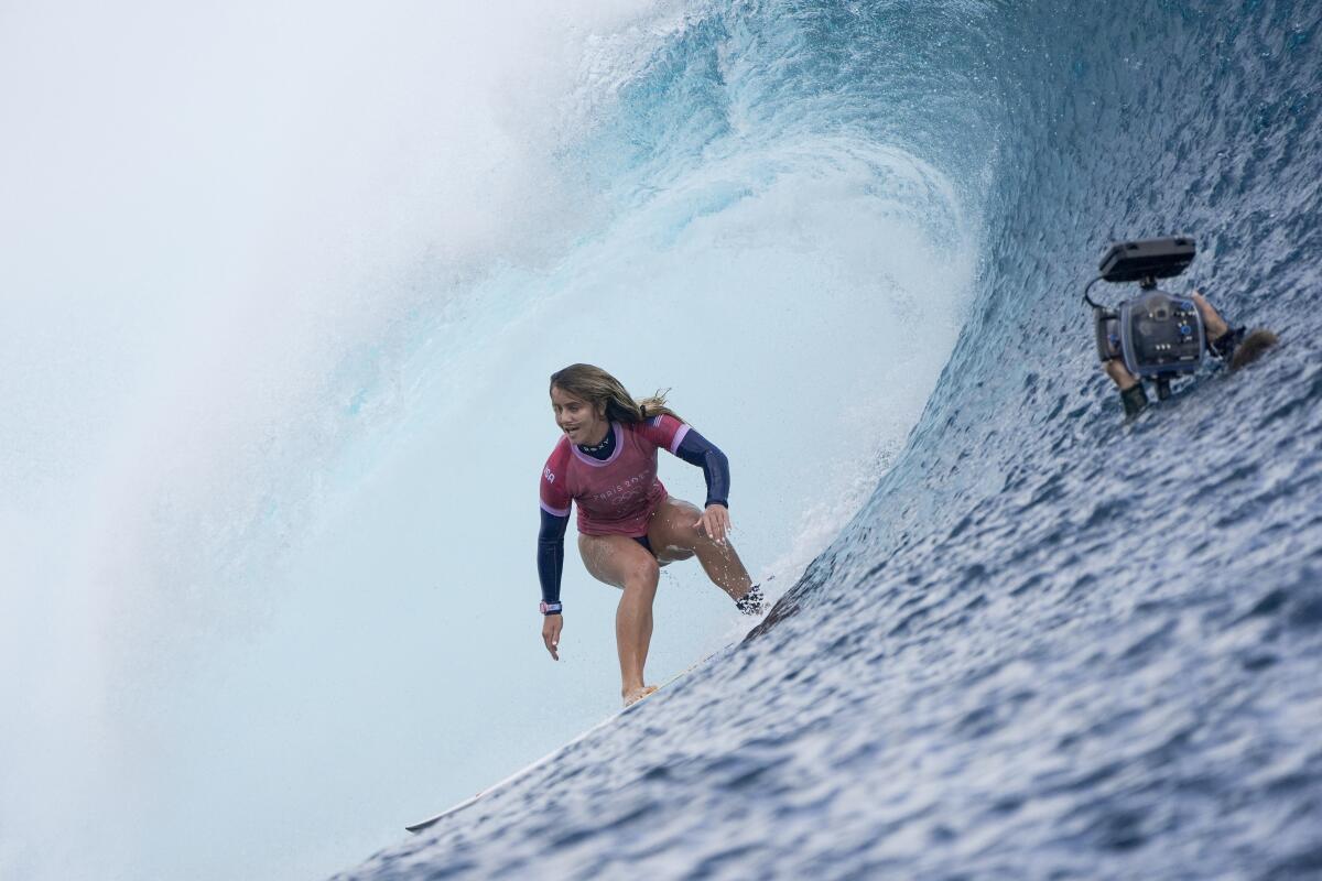 American Caroline Marks surfs during the gold medal match of the surfing competition